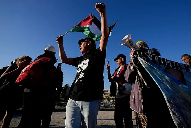 People against the draft of a new constitution celebrate after the polls close in Santiago