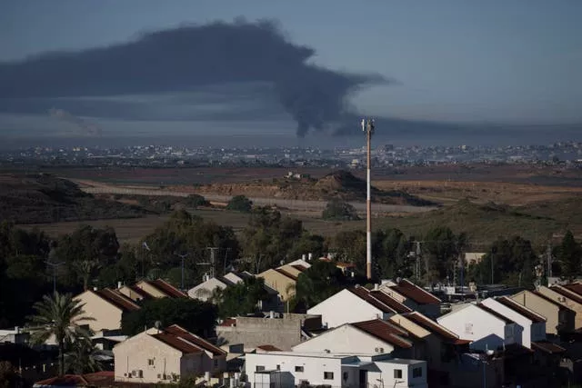Smoke rises following an Israeli bombardment in the Gaza Strip, as seen from southern Israel, on Friday