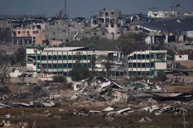 Destroyed farms and buildings in the Gaza Strip as seen from Southern Israel
