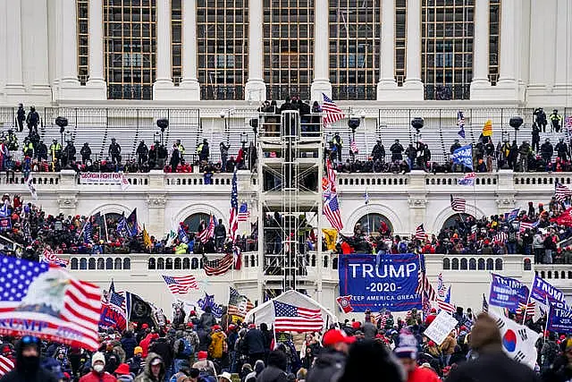 Insurrectionists loyal to President Donald Trump breach the US Capitol in Washington on January 6 2021