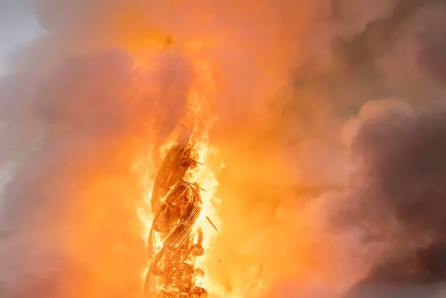 Fire rages from the dragon spire of the Stock Exchange in Copenhagen, Denmark