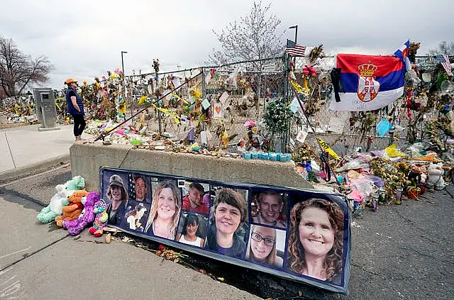 Tributes outside the supermarket following the mass shooting