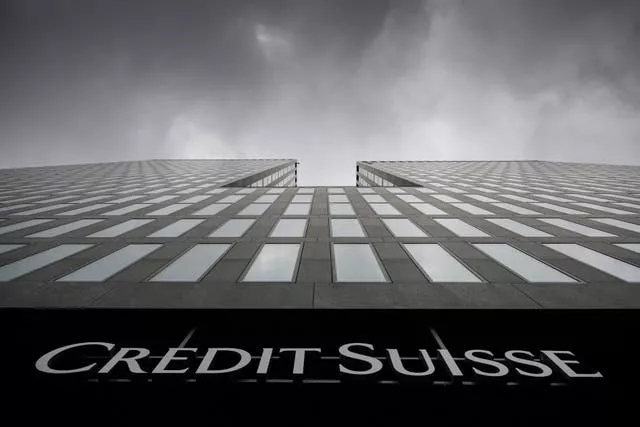 Grey clouds cover the sky over a building of the Credit Suisse bank in Zurich, Switzerland, on Feb. 21, 2022