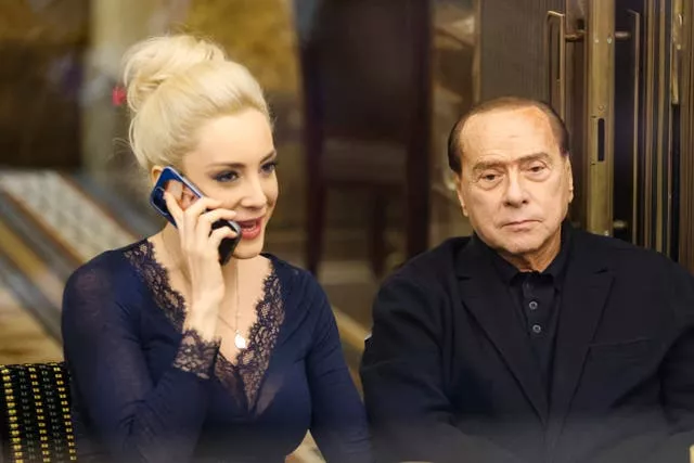 Mr Berlusconi and his partner