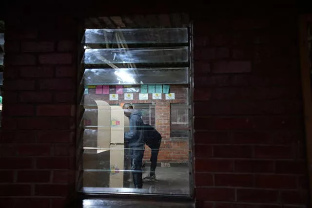A man casting his ballot in Harare