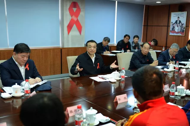 Then-Chinese cice premier Li Keqiang, centre, speaks at a symposium attended by representatives of HIV/Aids related non-governmental organisations and international organisations in Beijing, in November 2012