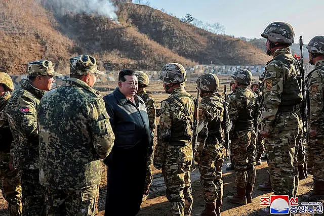 North Korean leader Kim Jong Un meets soldiers