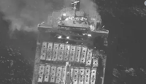 A black-and-white image showing a fire aboard the bulk carrier True Confidence 