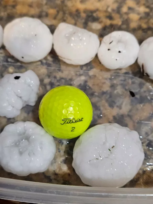 Massive chunks of hail and a golf ball 