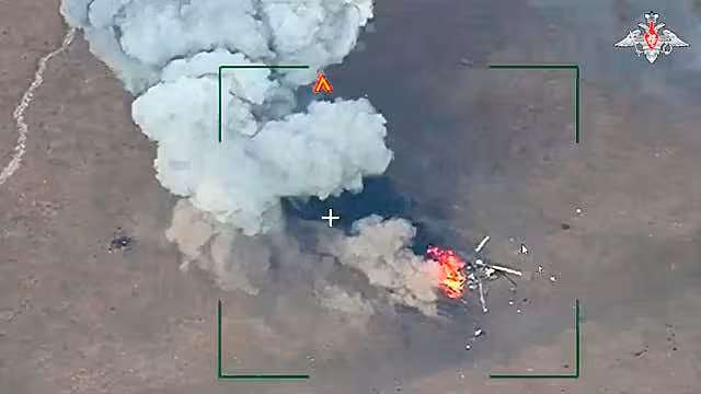 The destruction of a Ukrainian armed forces helicopter in the Donetsk region of eastern Ukraine