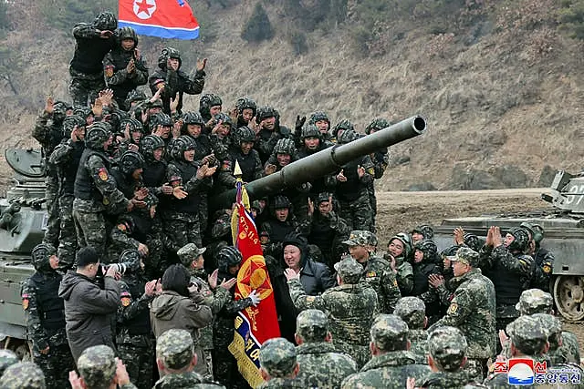 North Korea’s Kim Test Drives New Tank And Orders Troops To Prepare For War