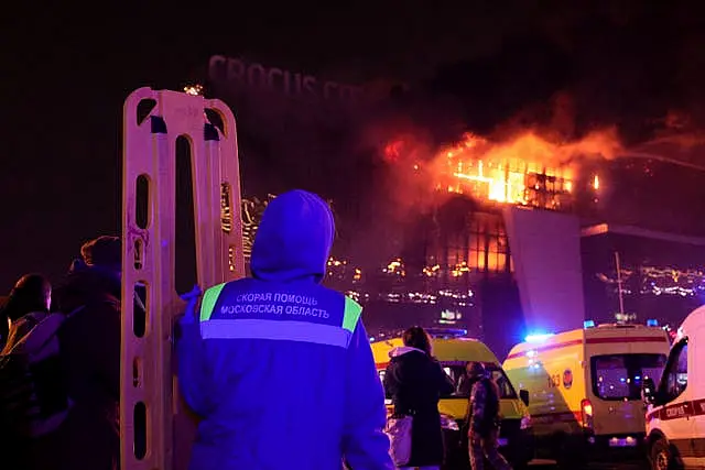 Medics look on at blaze