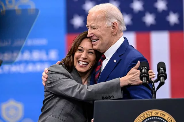 Vice President Kamala Harris embraces President Joe Biden