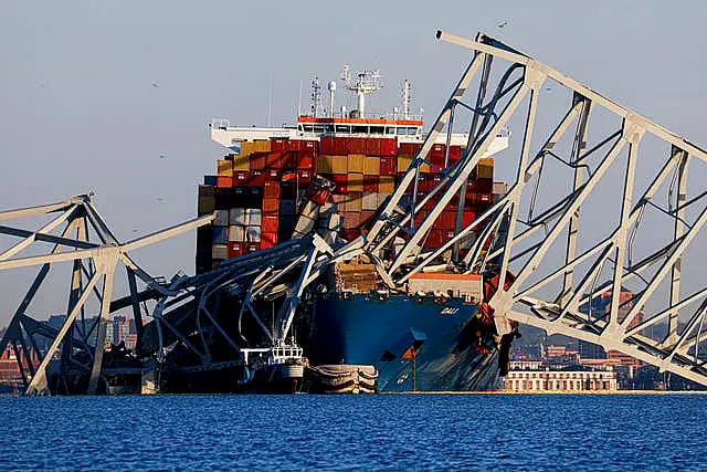 Wreckage of the Francis Scott Key Bridge rests on the container ship Dali