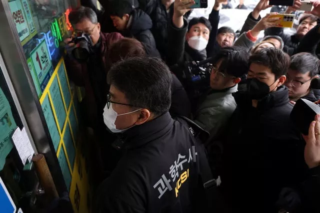 South Korea police at the office of the man who stabbed opposition leader Lee Jae-myung 