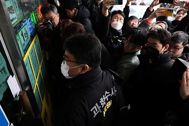 South Korea police at the office of the man who stabbed opposition leader Lee Jae-myung 