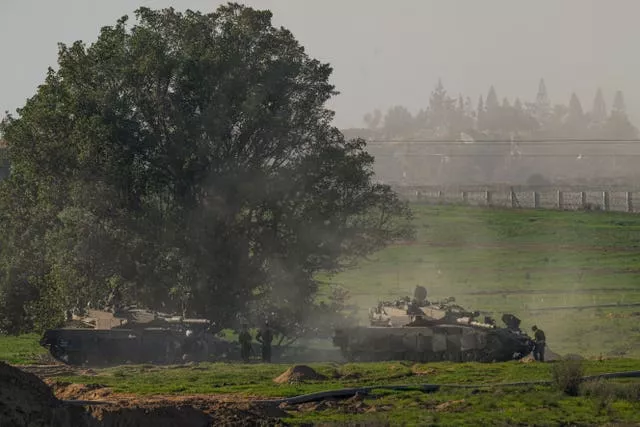 Israeli soldiers are seen near the Gaza Strip border, in southern Israel 