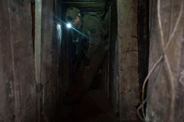 Israeli soldiers show journalists the tunnel 