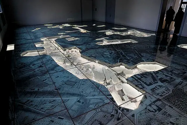 The giant marble map (Forma Urbis Romae) of ancient Rome is shown to the media in the Archaeological Park of Mount Celio Museum overlooking the Colosseum in Rome 