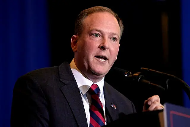 A close-up of Lee Zeldin speaking at a rally