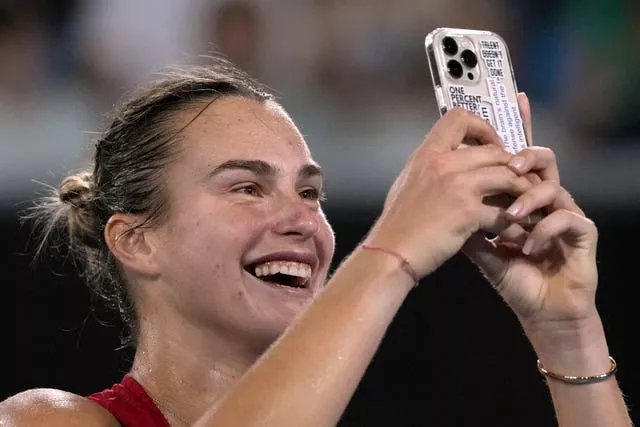 Aryna Sabalenka takes a selfie after beating Amanda Anisimova 