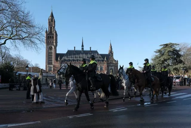 Police on horseback outside the Peace Palace, which houses the International Court of Justice in The Hague, Netherlands