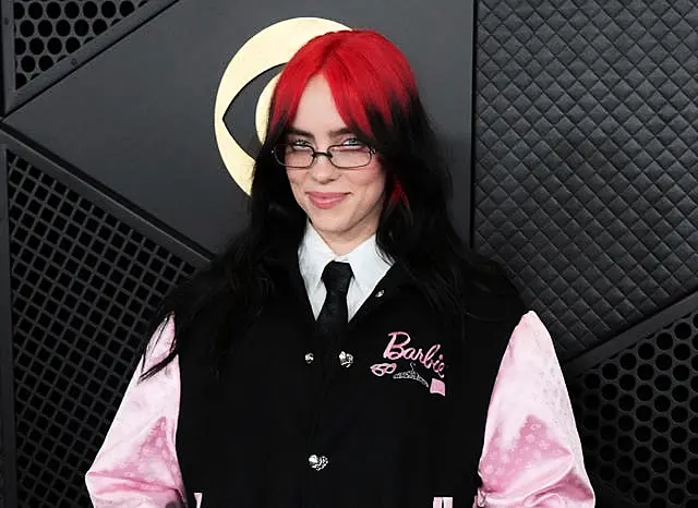 Billie Eilish, with red highlights in her hair, at the Grammys