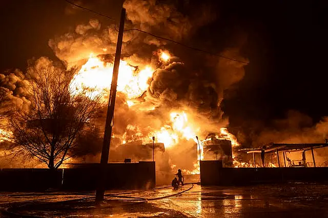 A building is consumed by flames