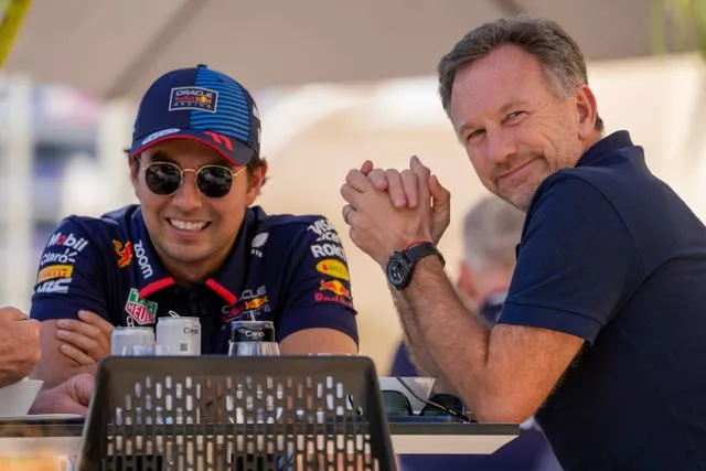 Sergio Perez (left) and Christian Horner 