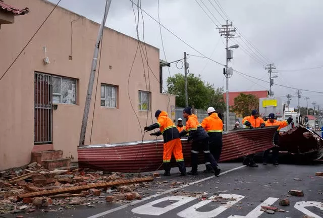 Rescue workers repair buildings