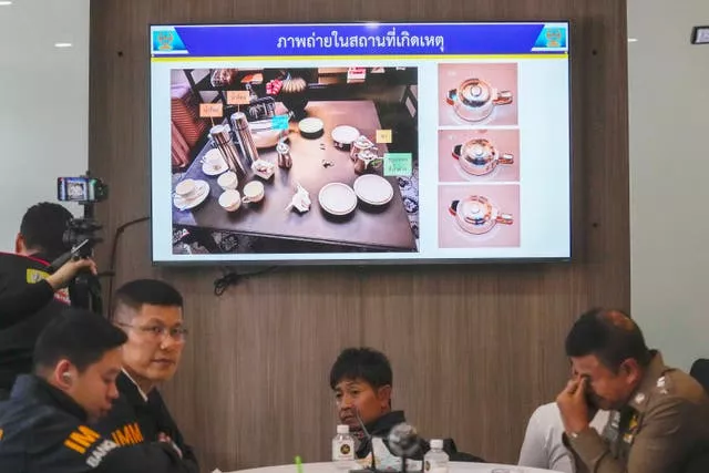 An image of cups presented by police at a press conference