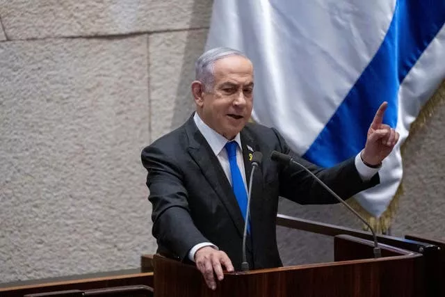 Israeli Prime Minister Benjamin Netanyahu addresses legislators in the Knesset