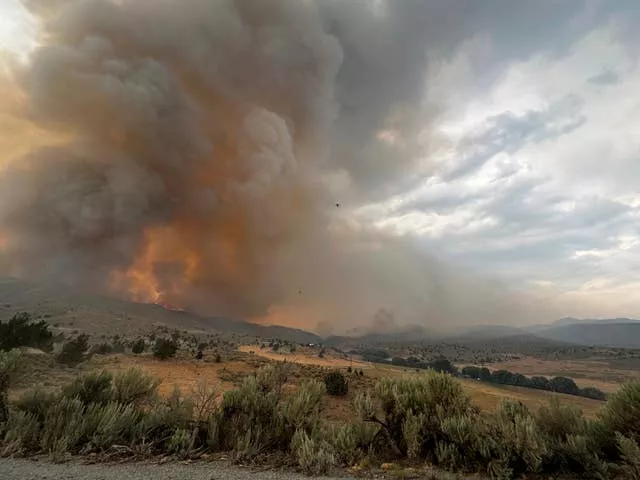 Smoke rises from a wildfire near Durkee in eastern Oregon