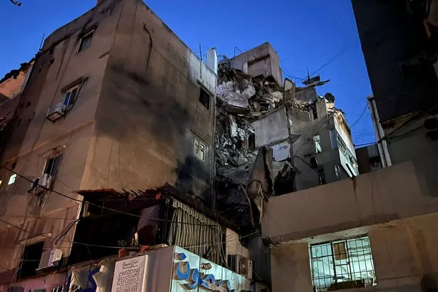 A damaged building that was hit by an Israeli airstrike in the southern suburbs of Beirut, Lebanon