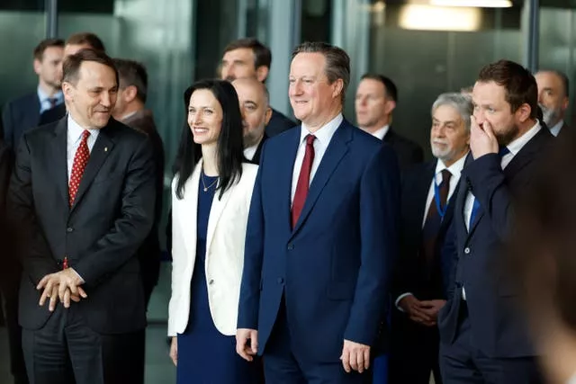 From left, Poland’s foreign minister Radoslaw Sikorski, Bulgaria’s foreign minister Mariya Gabriel, British Foreign Secretary Lord David Cameron and Estonia’s foreign minister Margus Tsahkna attend a ceremony to mark the 75th anniversary of Nato at Nato headquarters in Brussels 