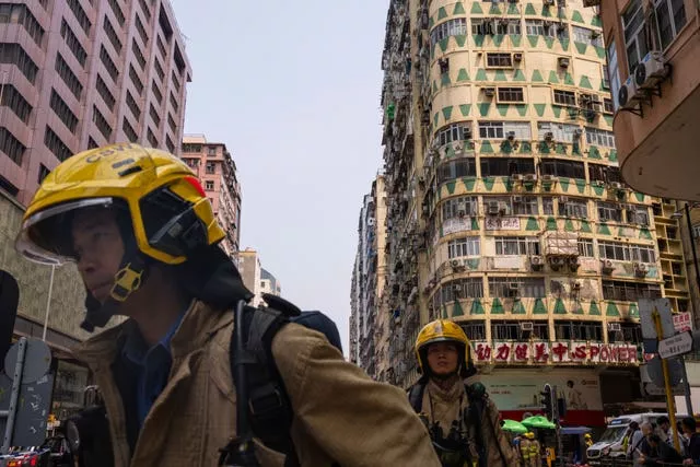 Firefighters at the scene of the blaze in Hong Kong