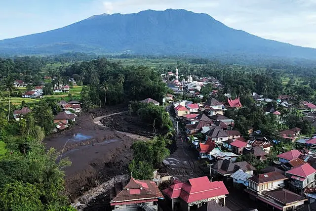 This drone photo shows the damage at a village affected by a flash flood in Tanah Datar, West Sumatra, Indonesia