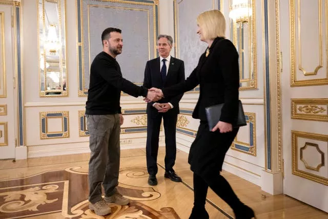 US Secretary of State Antony Blinken watches Ukraine’s President Volodymyr Zelensky, left, greet US Ambassador to Ukraine Bridget Brink 