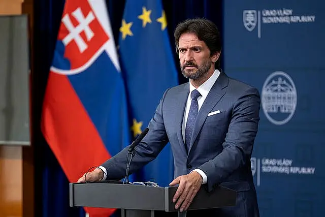 Deputy prime minister and defence minister of Slovakia Robert Kalinak arrives for a press conference at the government headquarters in Bratislava