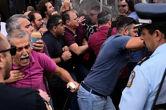 Protesters clashing with police outside the court