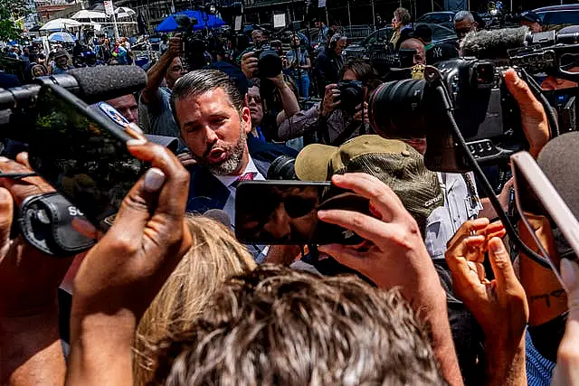 Donald Trump Jr speaks outside Manhattan Criminal Court in New York