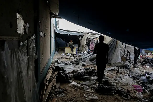 Palestinians inspect tents destroyed by Israel’s bombardment 