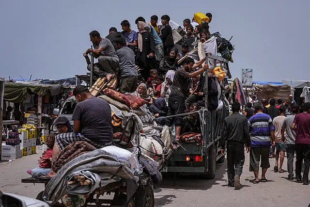 Palestinians fleeing from the southern Gaza city of Rafah during an Israeli ground and air offensive in the city