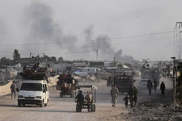 Palestinians fleeing from the southern Gaza city of Rafah during an Israeli ground and air offensive in the city