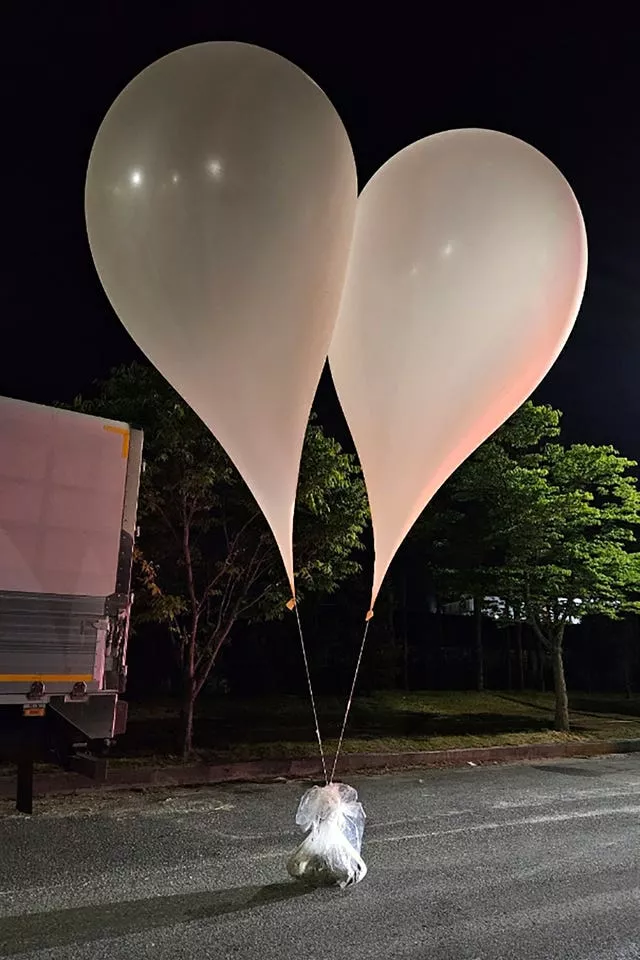 Two large balloons carrying propaganda material
