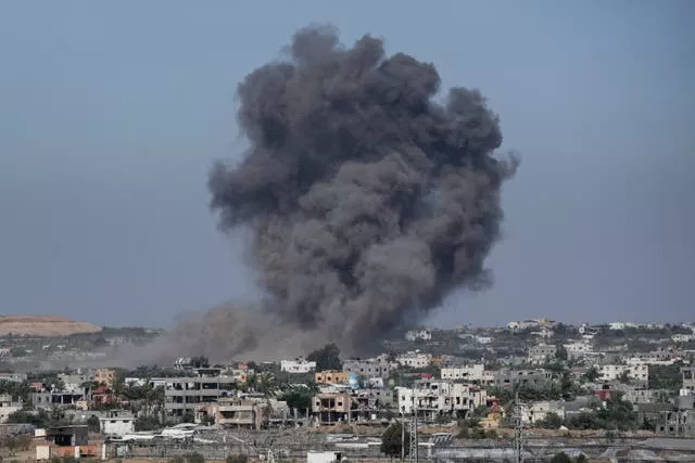 A cloud of black smoke rises over Gaza