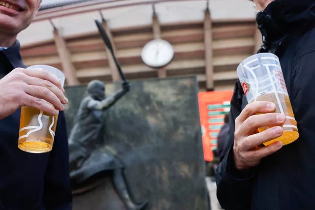 Fans drink beer at the French Open