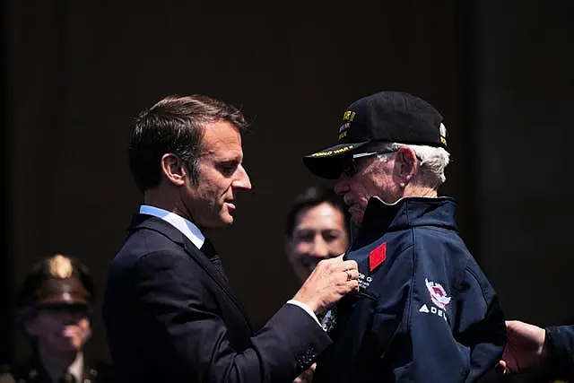 Victor Charey is awarded the Legion of Honour by Emmanuel Macron