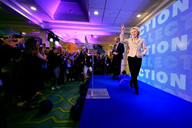 Lead candidate for the European Commission, current European Commission president Ursula von der Leyen walks on to the stage during an event at the European People’s Party headquarters in Brussels 