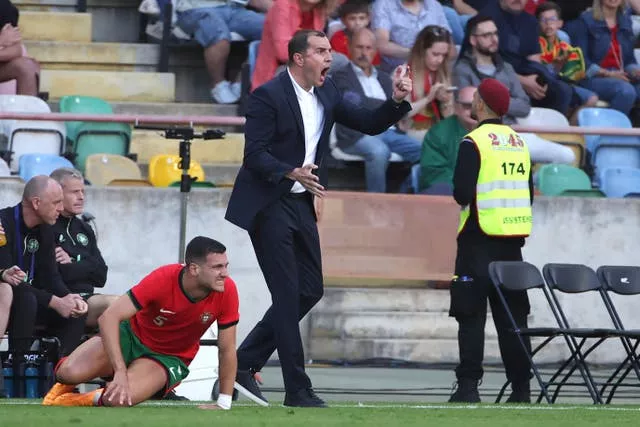 Ireland boss John O'Shea shouts instructions to his players on the touchline
